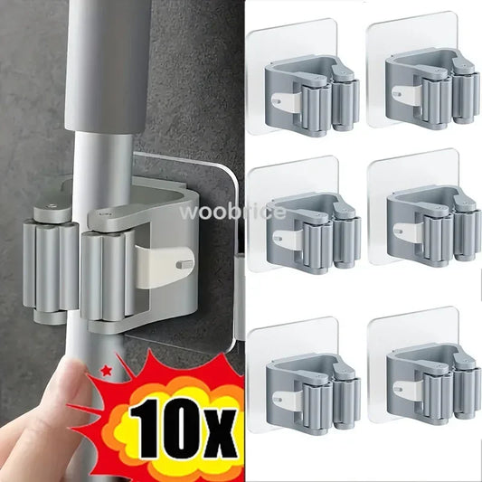 Self-adhesive mop holder 